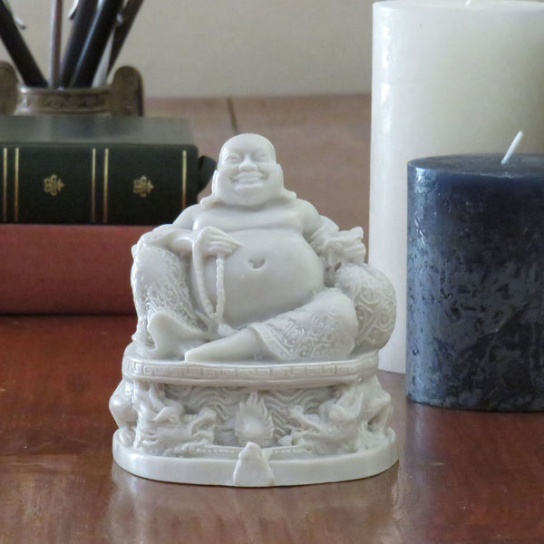 Happy Buddha on a Dragon Base