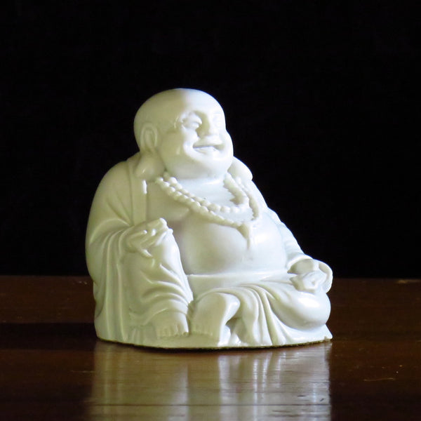 Fat bellied Lucky Buddha with a Bat