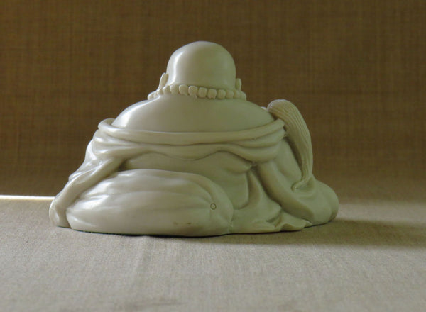 Seated Chinese Style, fat bellied Buddha in Reconstituted marble