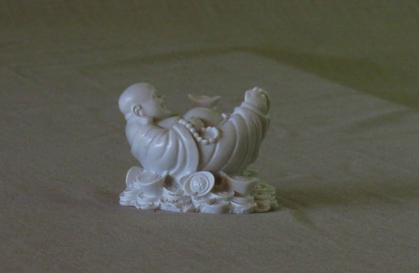 Laid back Chinese style Buddha of good fortune.